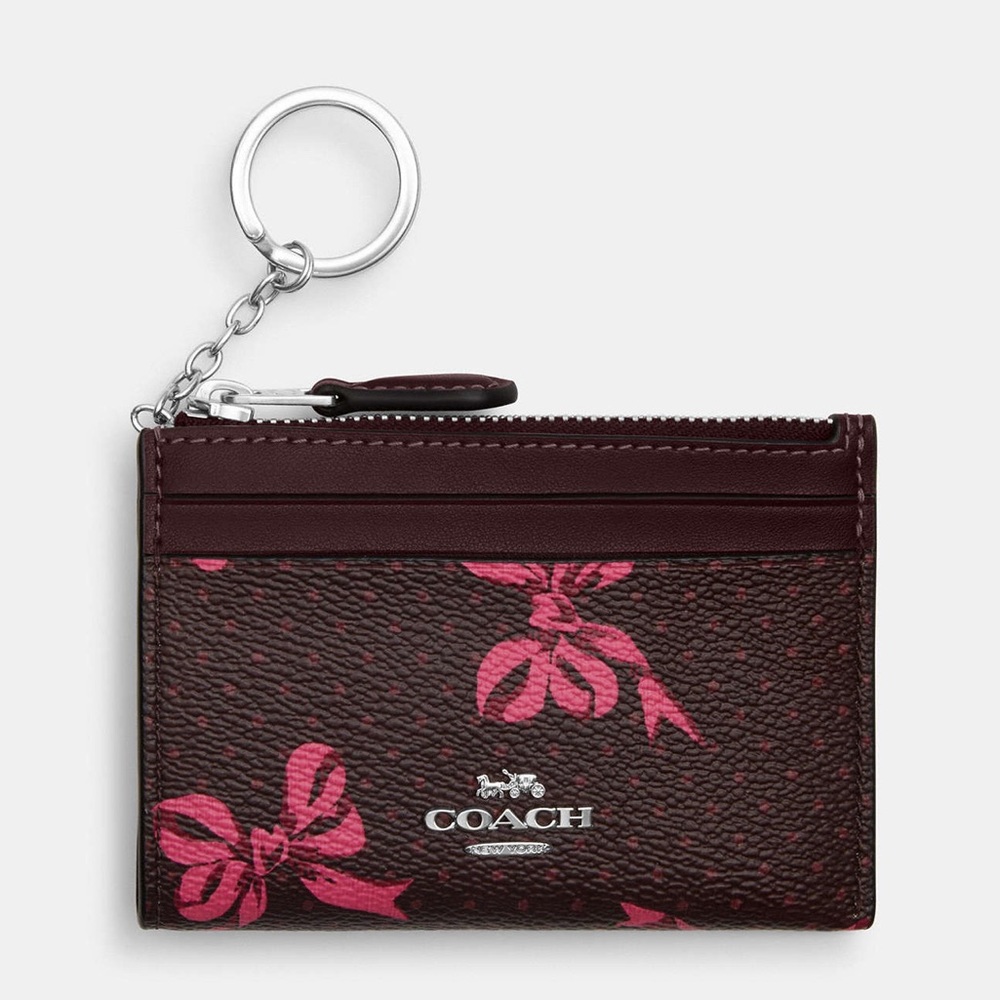 SOLD !!!Coach Mini Skinny Id Case With Bow Print